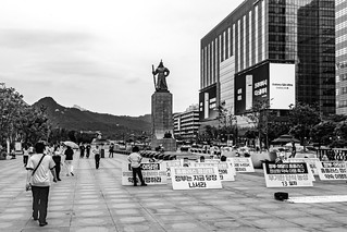 Admiral Yi Sun-sin Presides over a Quiet Street Demonstration in Seoul (marc.barrot)